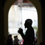 A Philippine Muslim prays during Friday A Philippine Muslim prays during Friday